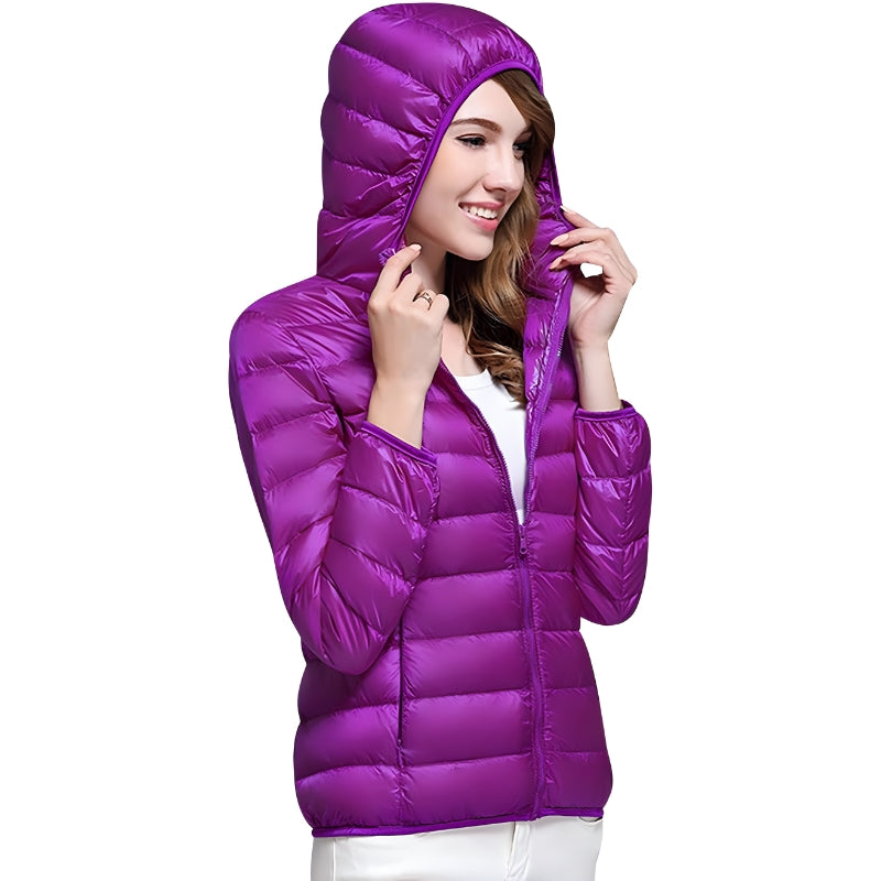 Damjacka med huva och vadderad design