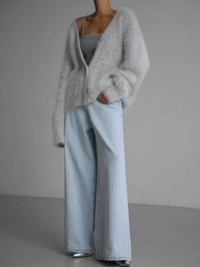 Damkofta med överdimensionerad v-ringning och långa ärmar i stickad modell