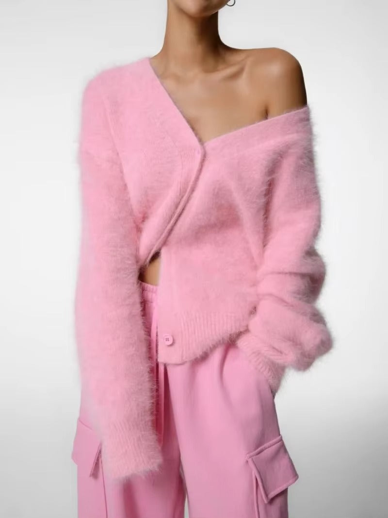 Damkofta med överdimensionerad v-ringning och långa ärmar i stickad modell