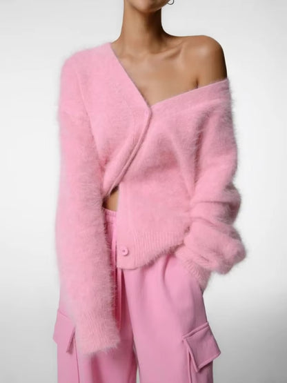 Damkofta med överdimensionerad v-ringning och långa ärmar i stickad modell